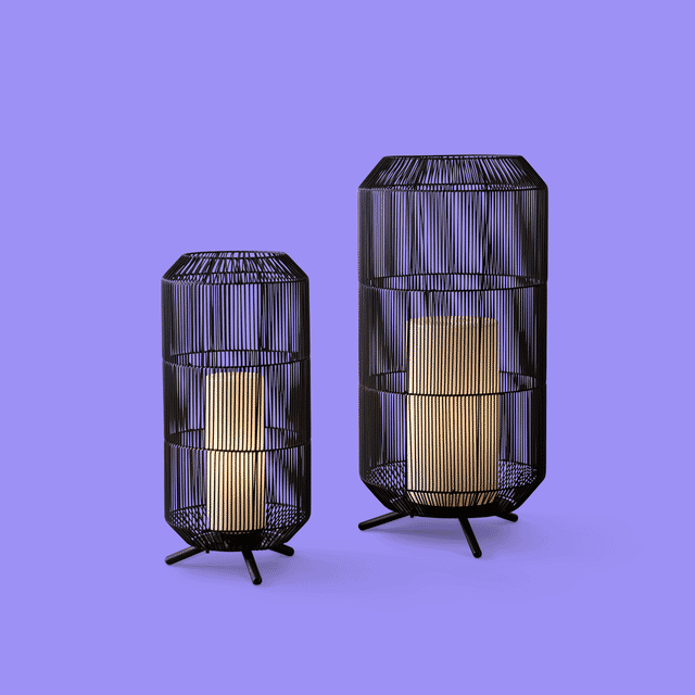 Two illuminated black wire table lamps isolated on white after clipping path editing, with a close-up of the wire edges.