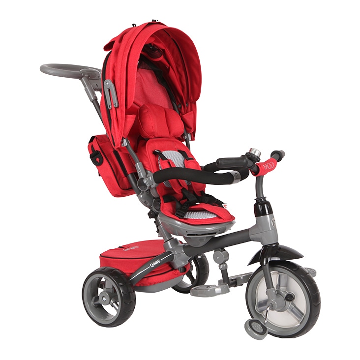 Red and gray baby stroller with canopy and accessories, edited using complex clipping path for detailed presentation.