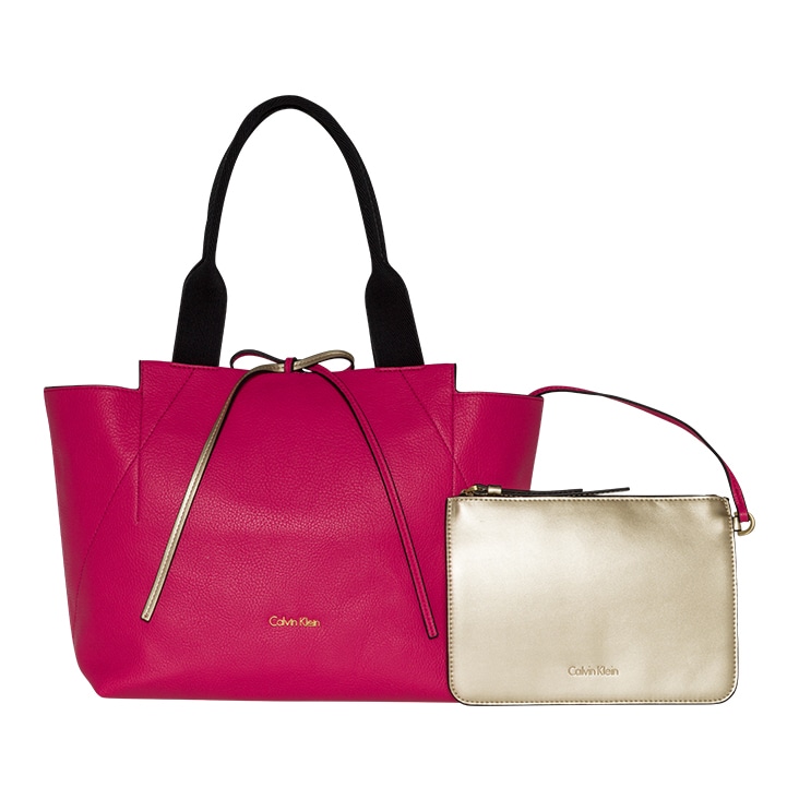 Pink designer tote bag paired with a gold pouch, refined using medium clipping path for sharp detailing.