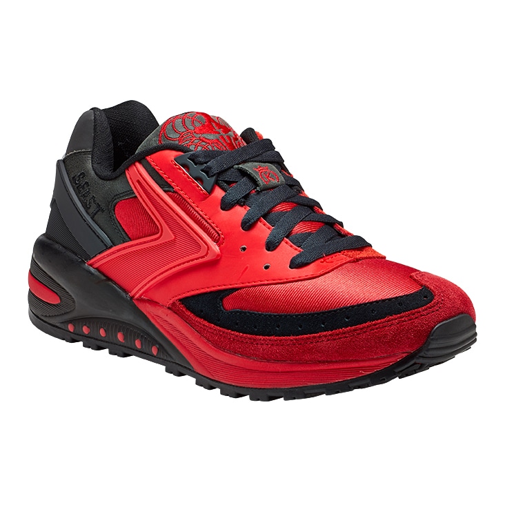 Red and black sneaker with detailed design, edited using medium clipping path for a polished presentation.