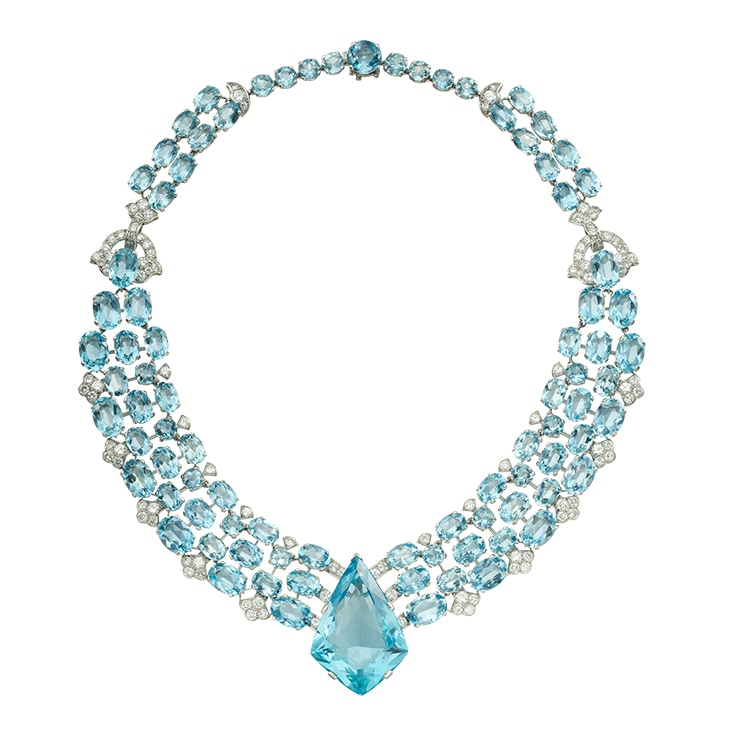 Elegant aquamarine and diamond necklace with intricate details, refined using complex clipping path techniques.