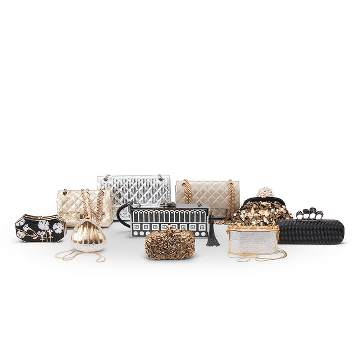 A collection of luxury handbags with intricate details, enhanced by complex natural shadows for a realistic and elegant display.