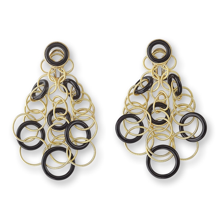 Gold and black earrings with a subtle drop shadow, enhancing depth and making the product stand out.