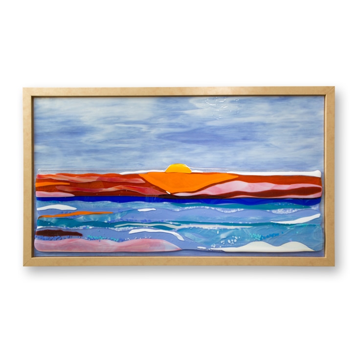 A vibrant framed artwork featuring a sunset, enhanced with a subtle drop shadow to add depth and realism.