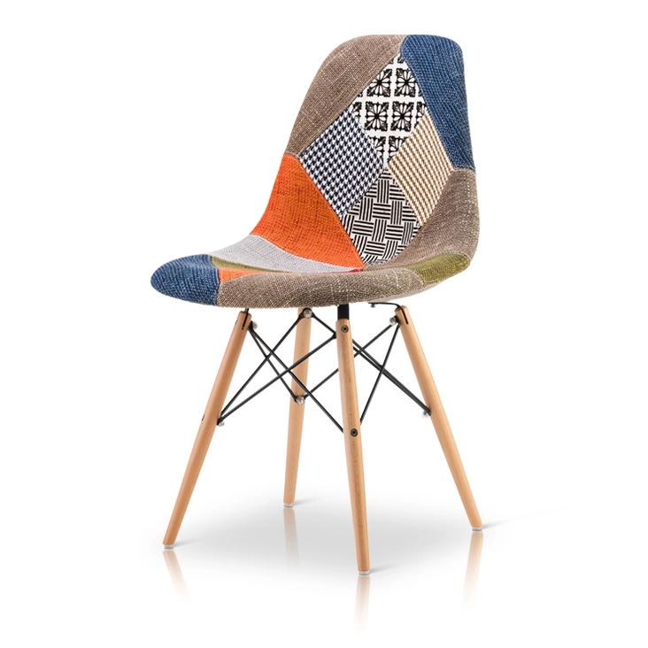 A colorful patchwork chair with wooden legs, enhanced with a reflection shadow for a sleek, polished presentation.