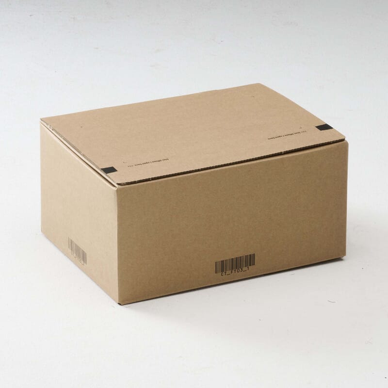 Cardboard box with a natural shadow