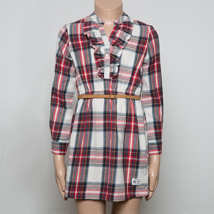 Plaid dress with ruffle neckline and tan belt, displayed on a mannequin before ghost mannequin editing.
