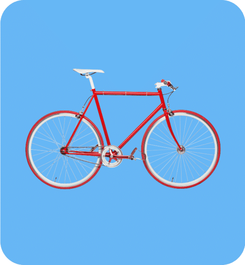 Red bicycle on a bright blue background with clean clipping path background removal for product photography.