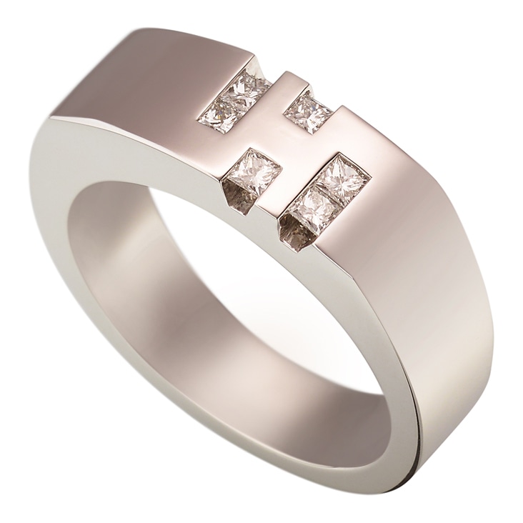 Platinum ring with square-cut diamonds, shown with a polished surface after camera reflection removal.