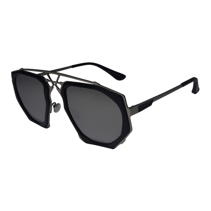 Close-up of designer sunglasses with clean lenses and polished frame after dust and scratch removal.