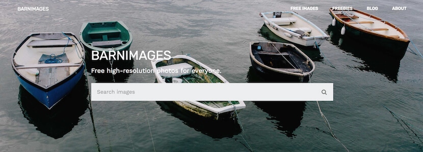 Search bar on BarnImages website with boats on water, offering free high-resolution photos