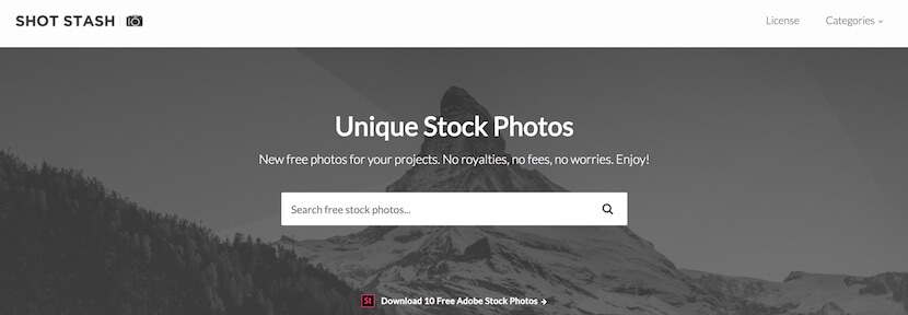 ShotStash homepage with search bar for unique royalty-free stock photos, featuring mountain backdrop