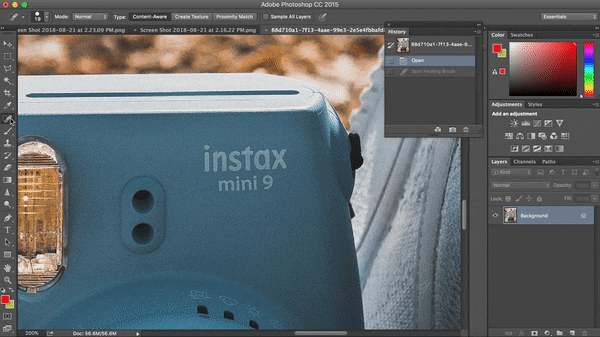 Close-up of logo removal on product photo using Adobe Photoshop tools.