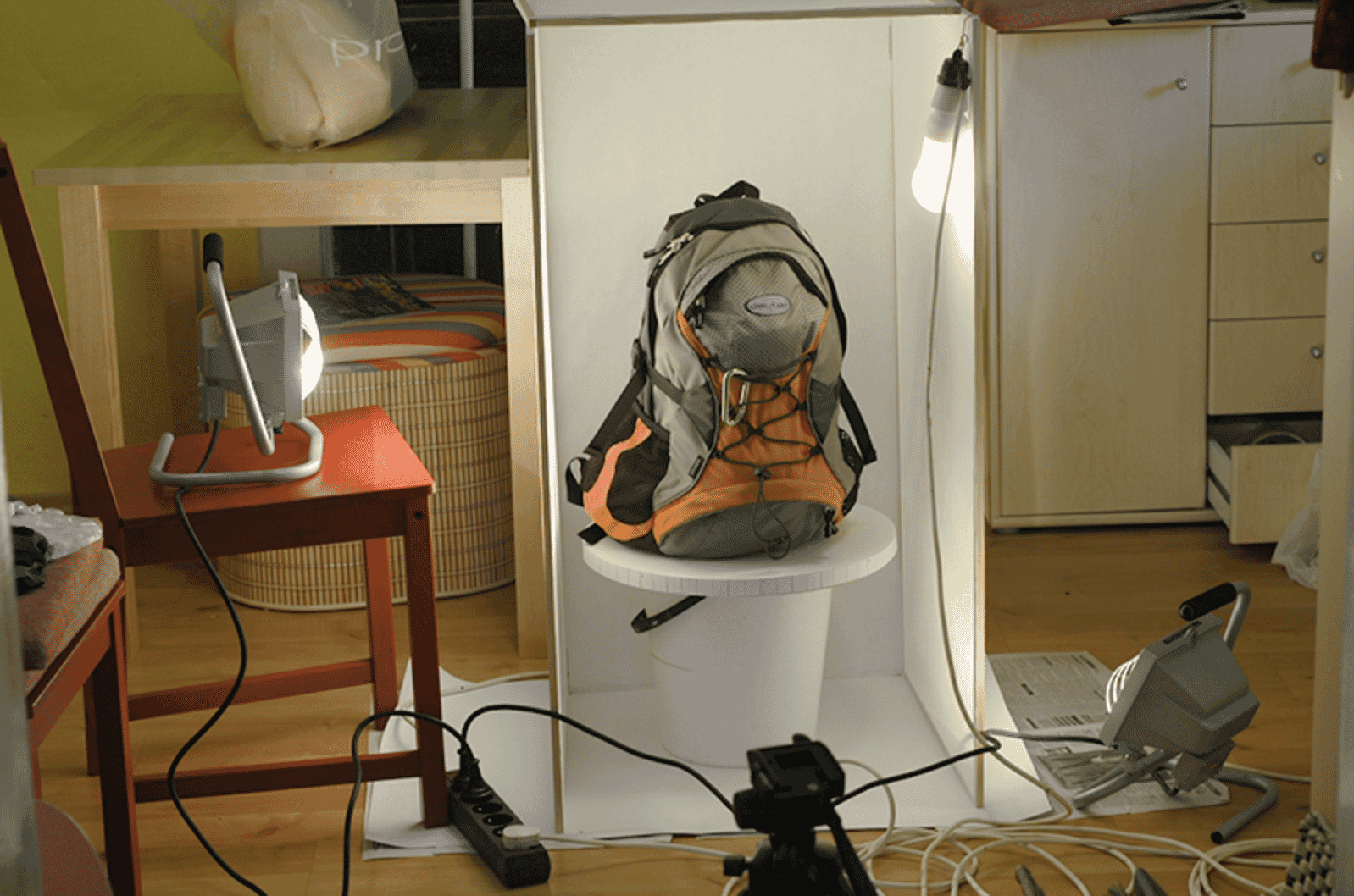 DIY 360-degree photography setup with lights and camera capturing backpack
