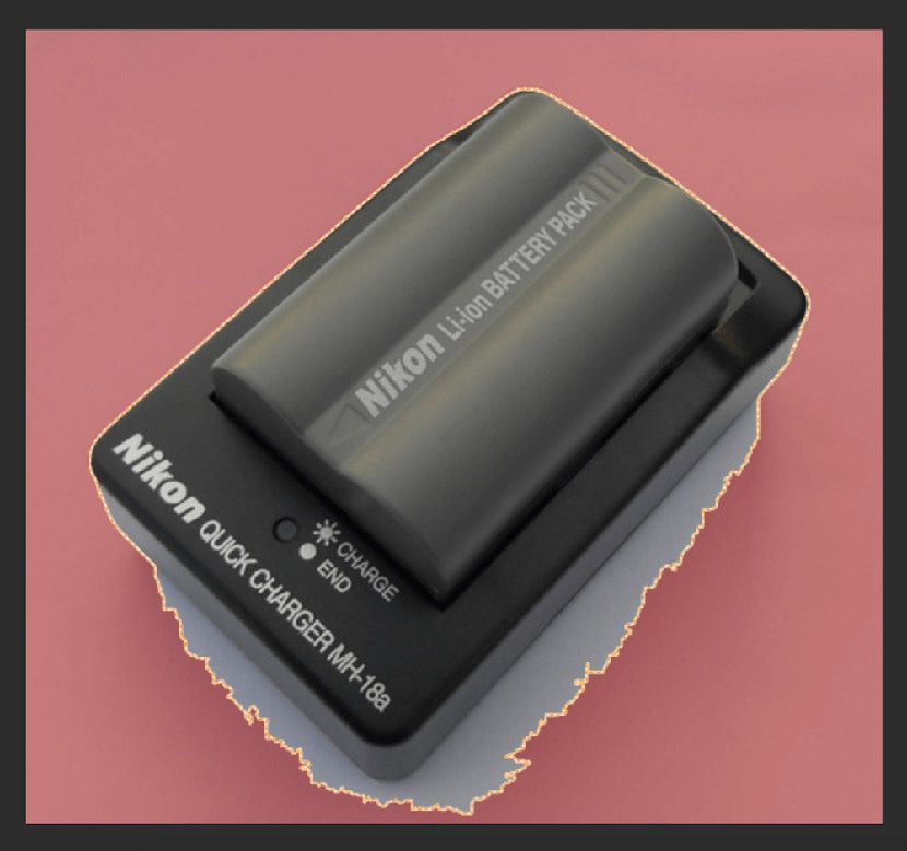 AI photo editor struggling with clipping path accuracy on Nikon battery charger against pink background.