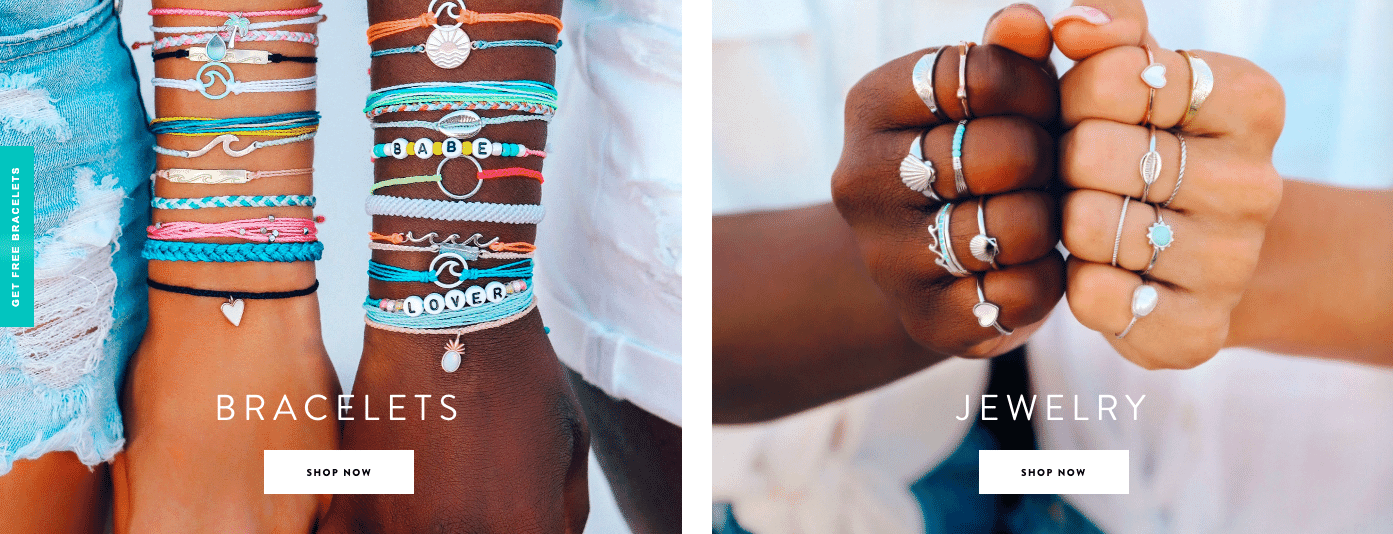 Two arms with layered bracelets and hands displaying rings, showcasing vibrant jewelry collections