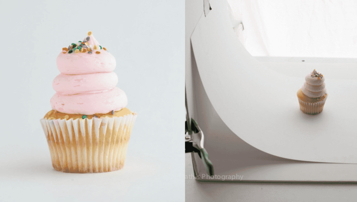 Cupcake with pink frosting and sprinkles on a white background, shown with photography setup