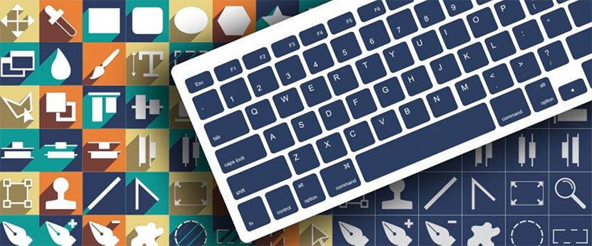 Keyboard overlaying a background of colorful graphic design tool icons, symbolizing digital design tools.