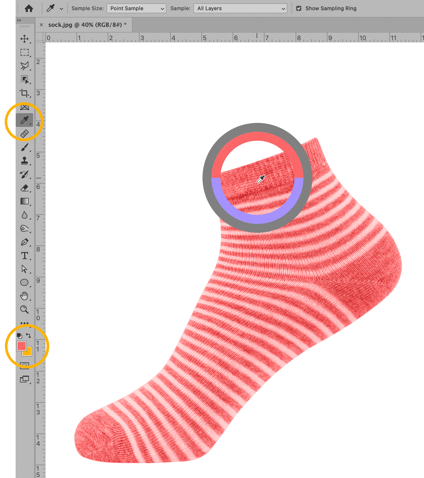 Photoshop interface using Eyedropper Tool with sampling ring on a red and pink striped sock.