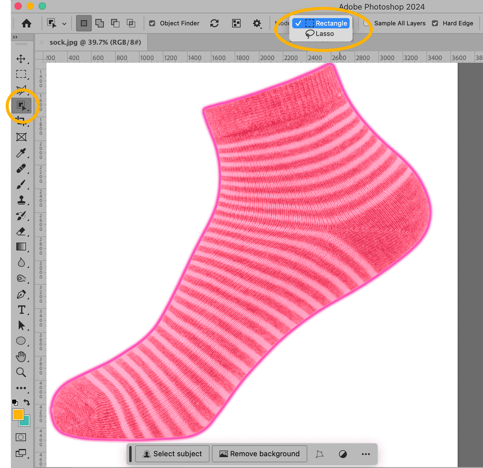 Sock image in Photoshop selected with Lasso tool, background removal options highlighted in the toolbar.
