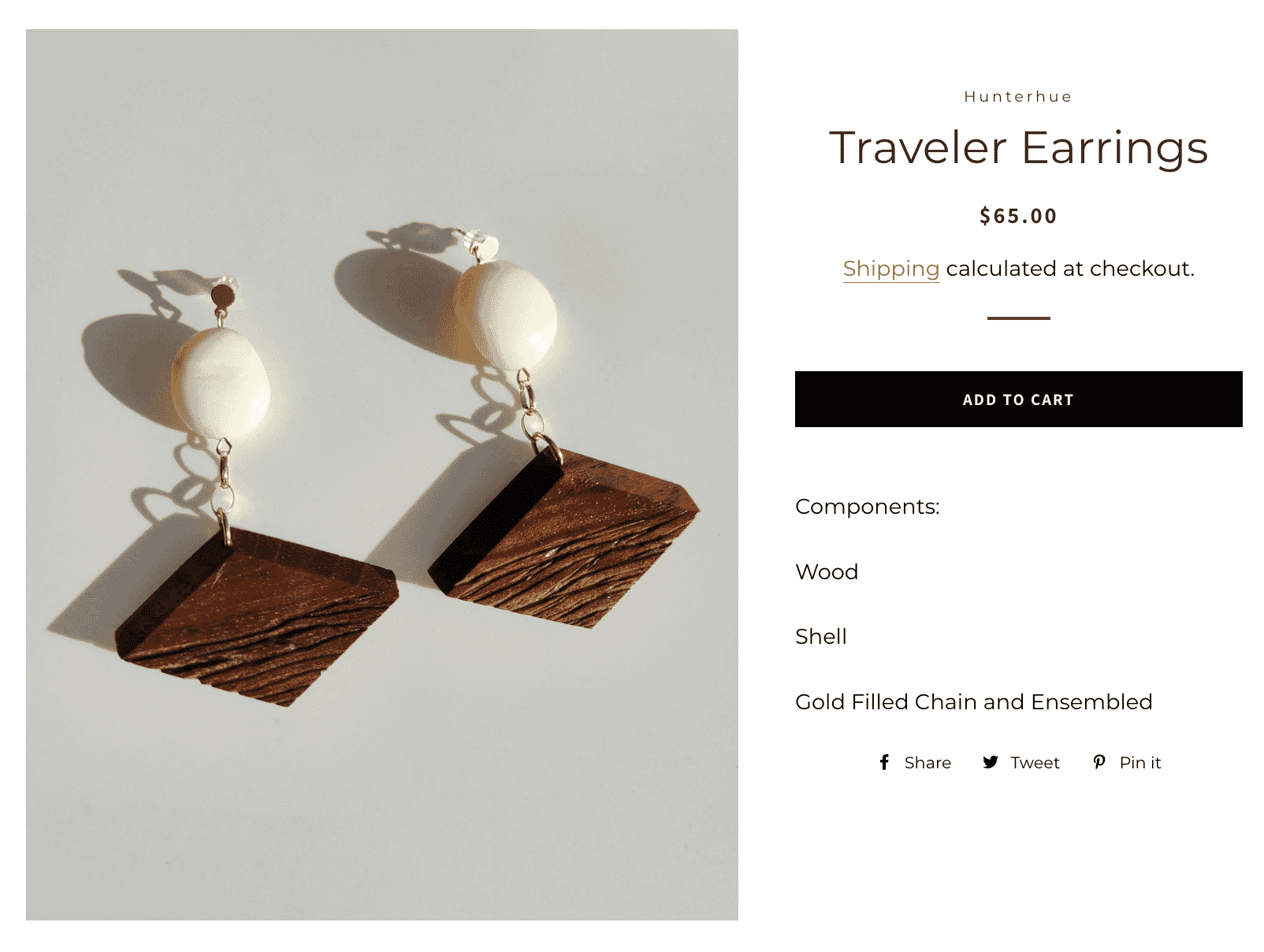 Traveler earrings by Hunterhue featuring wood and shell components on a gold-filled chain