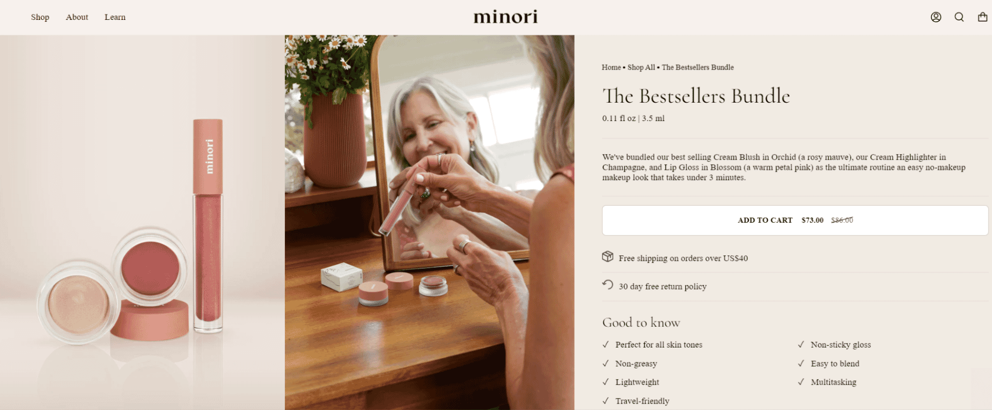 Minori Bestsellers Bundle makeup set with cream blush, highlighter, and lip gloss on display near a mirror with a woman applying lip gloss.