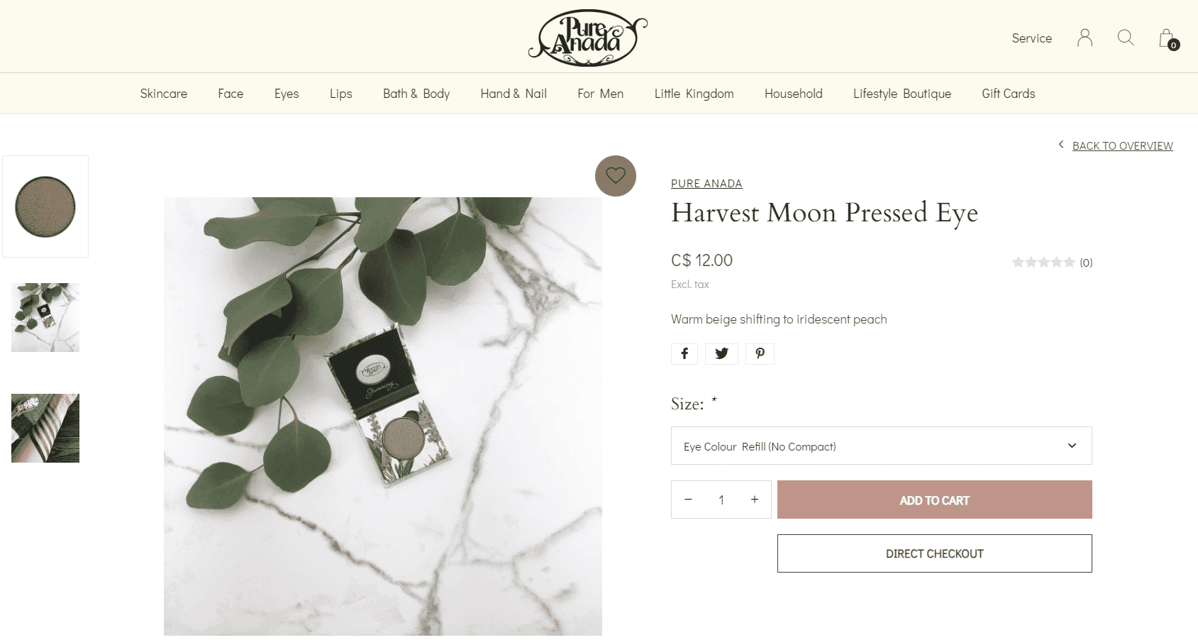 Pure Anada Harvest Moon eye shadow in warm beige with iridescent peach, shown on marble background with eucalyptus leaves.