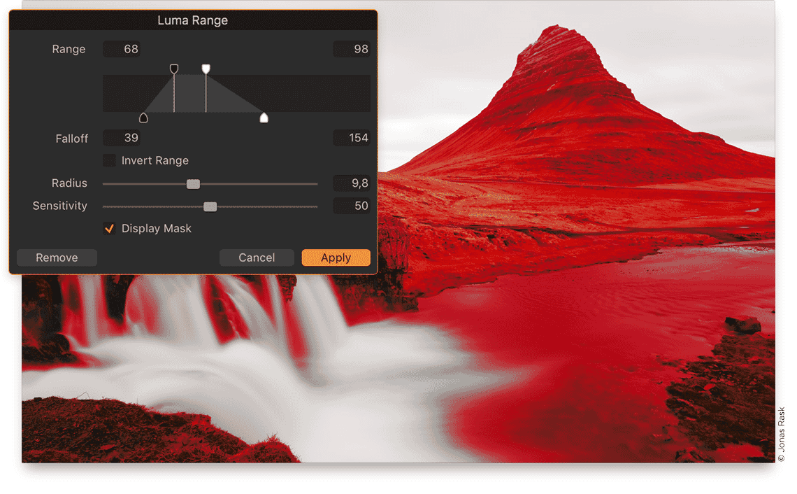 Luma Range adjustment panel for selective masking applied to a red-highlighted mountain landscape with waterfall.