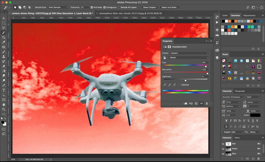Photoshop CC18 Hue/Saturation adjustment changing sky background to bold red color around drone.