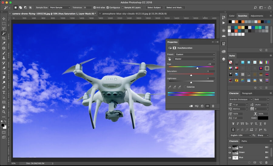 Photoshop CC18 Hue/Saturation adjustment applied to sky background for vibrant color change around drone.