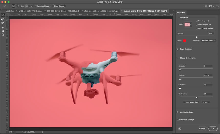 Refining sky mask around drone in Photoshop CC18 using larger brush size.