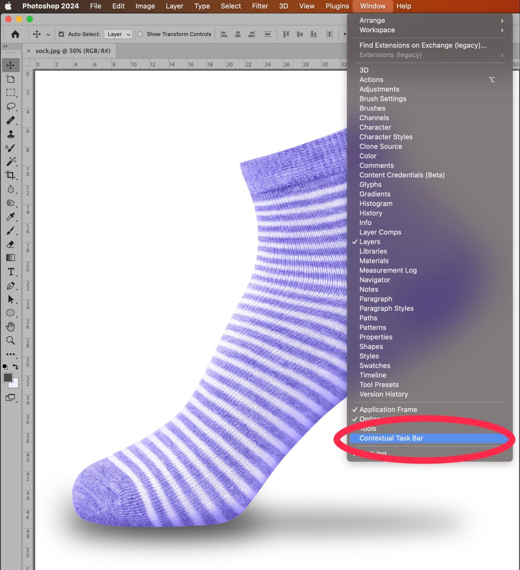 Photoshop selection tool outlining a purple sock image for background removal