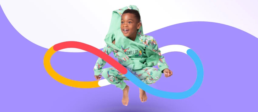 Child in vibrant green outfit jumps with colorful abstract graphics on a purple background.