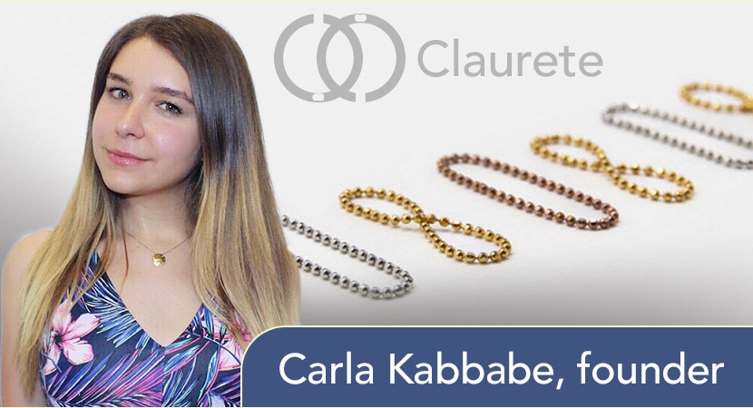 Carla Kabbabe, founder of Claurete, standing beside jewelry chain designs and brand logo.