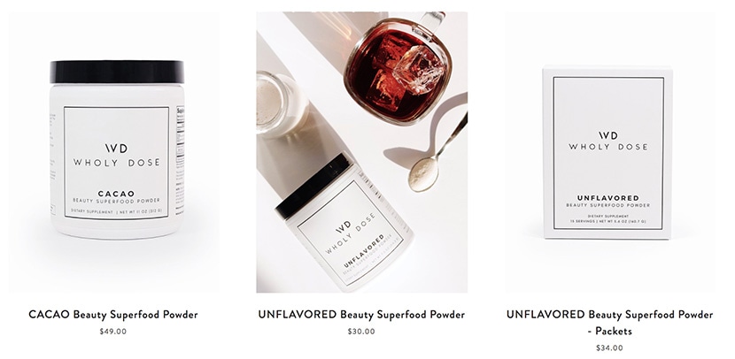 Wholy Dose beauty superfood powders in cacao and unflavored varieties, shown in jars and packet form.