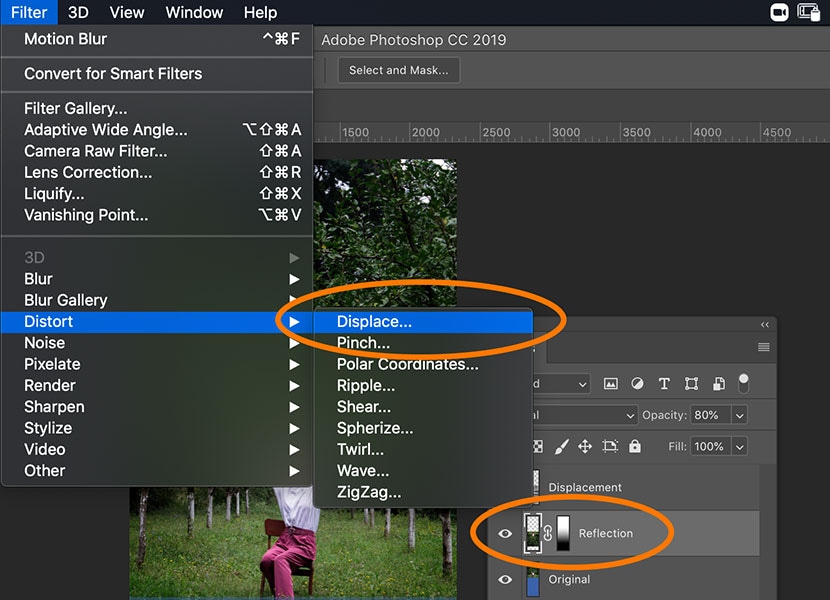 Using the Displace filter on the reflection layer in Photoshop under the Distort menu for a realistic water effect.