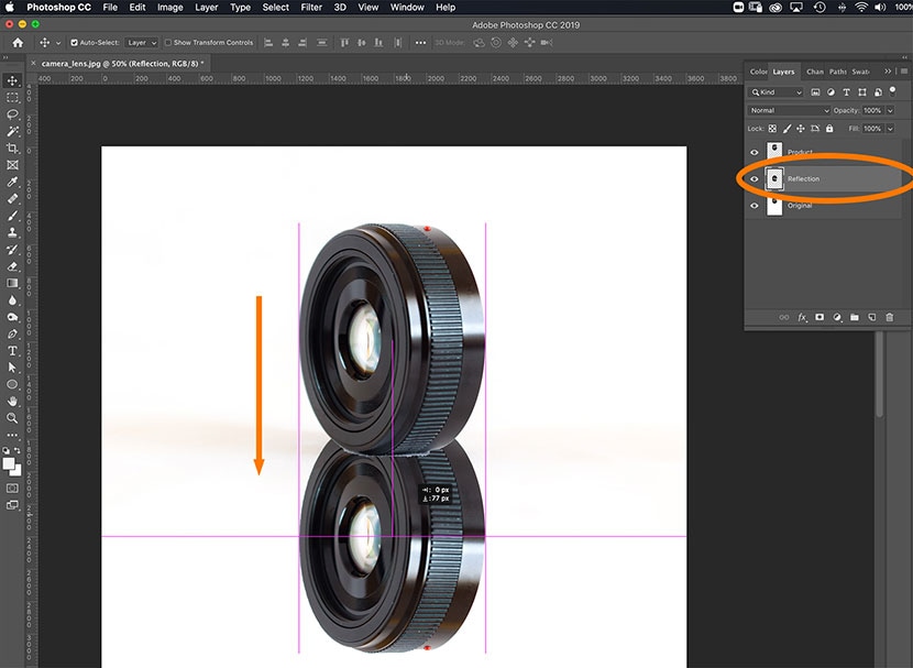 Positioning the flipped reflection layer beneath a camera lens in Photoshop for a realistic reflection effect.