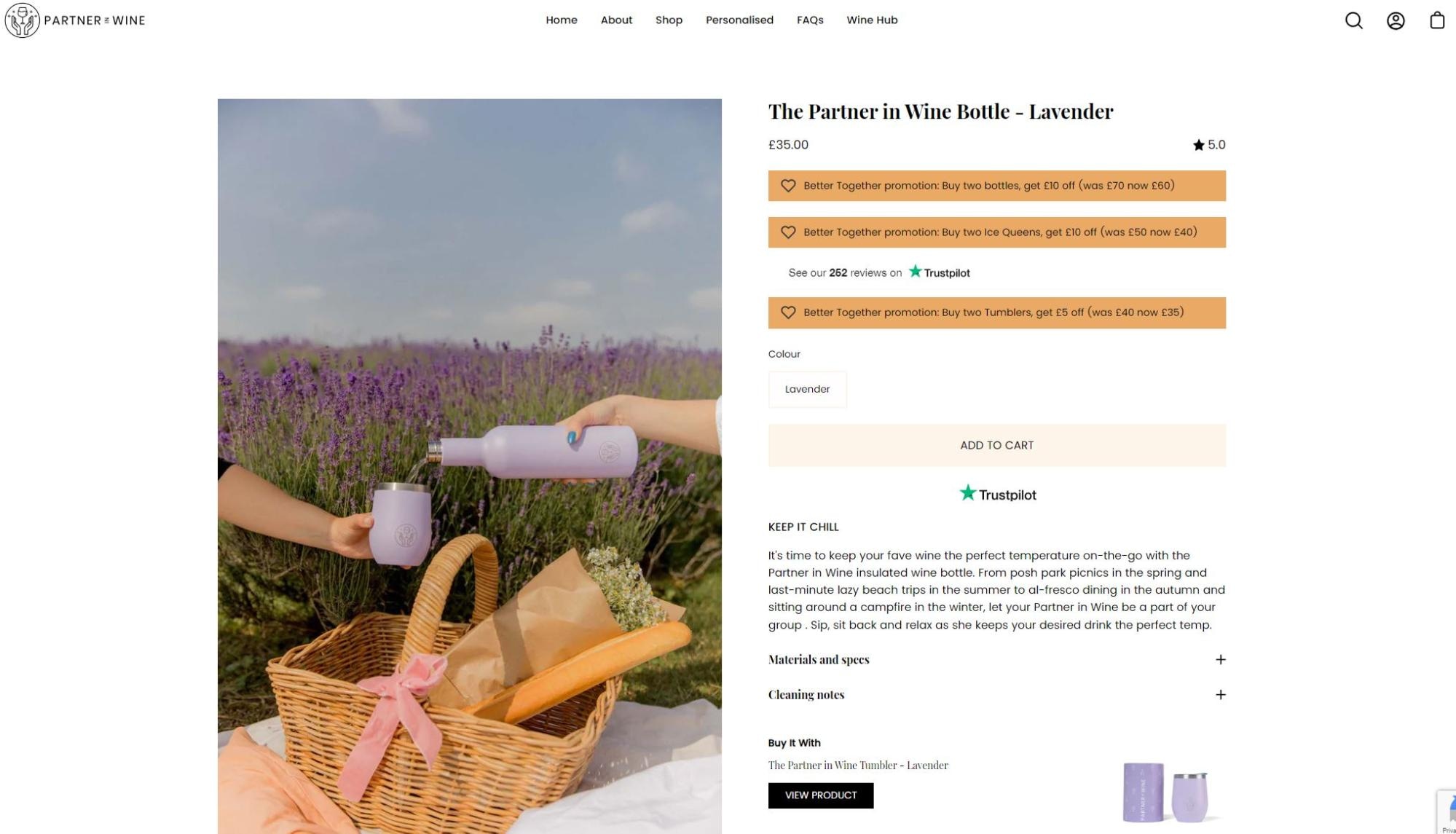 Partner in Wine lavender insulated bottle being poured into a matching cup during a picnic by a lavender field.