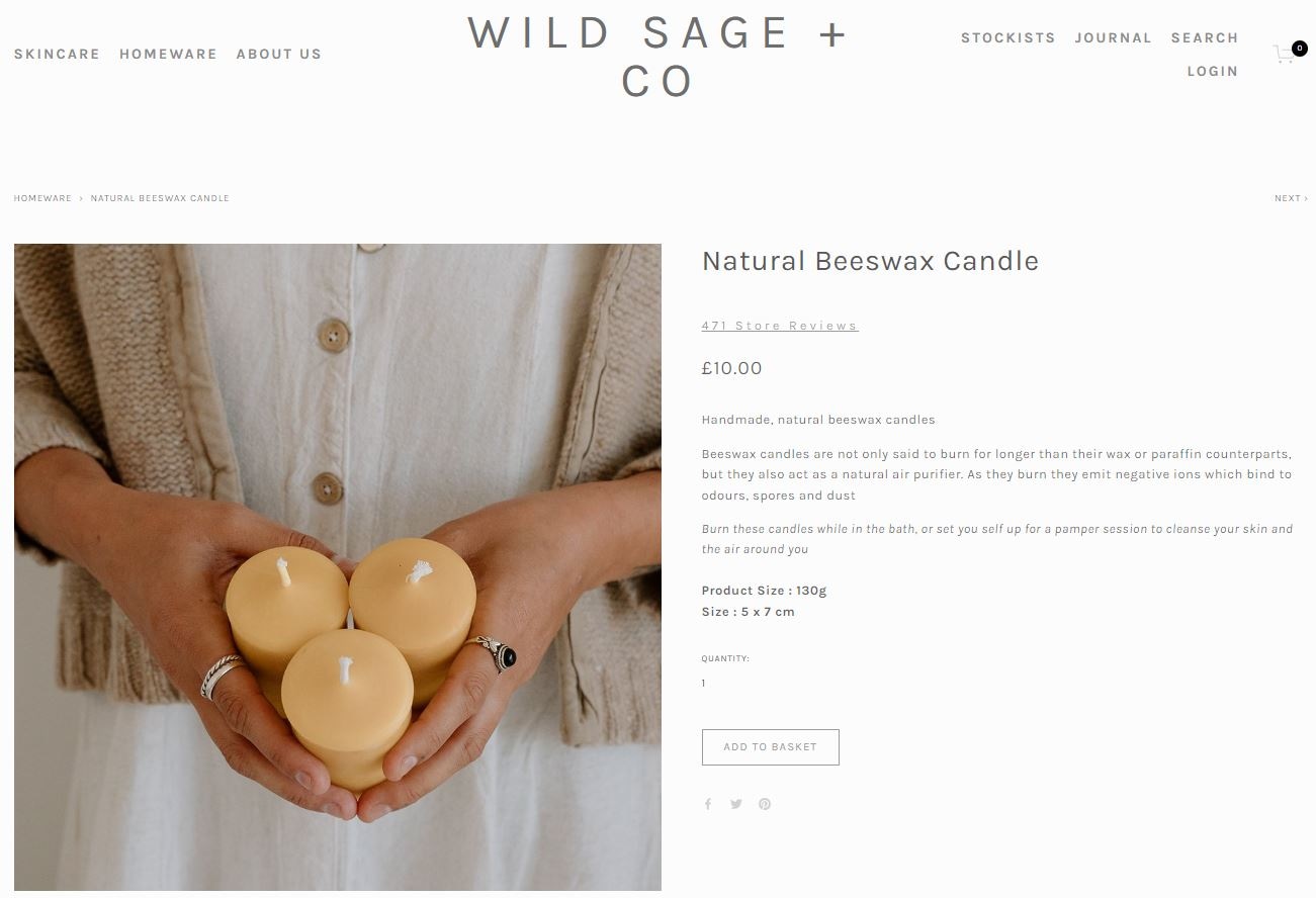 Wild Sage + Co handmade natural beeswax candles held in hands, offering natural air purification benefits