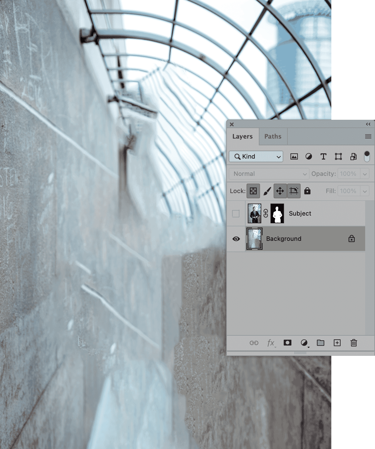 Photoshop layers panel showing blurred background layer for focused subject effect