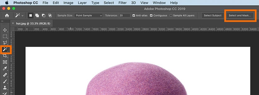 Selecting the Magic Wand tool and using Select and Mask in Photoshop for image editing.