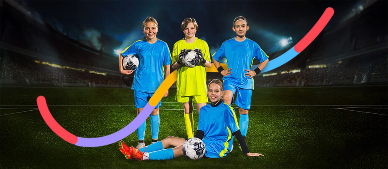 A digitally created composite photo of a soccer team in red jerseys posing in a stadium under bright lights.