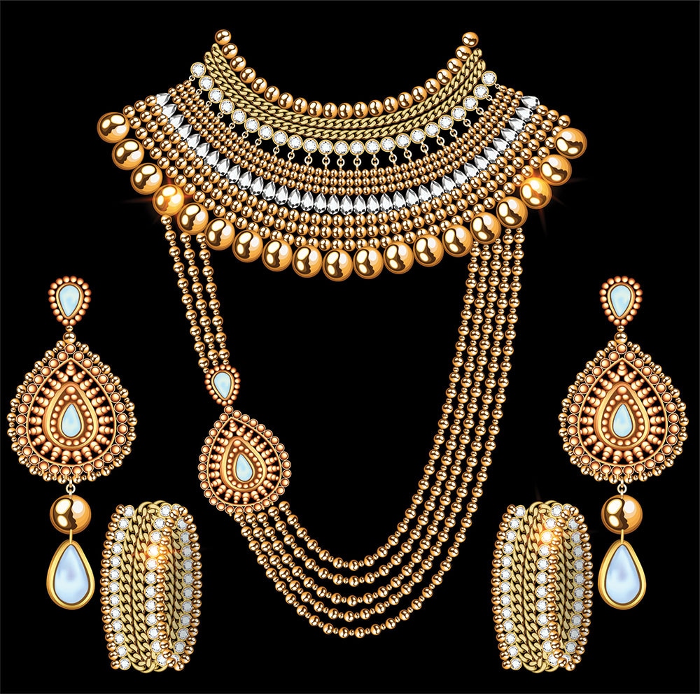 Gold and pearl jewelry set with necklace, earrings, and bangles on a new background