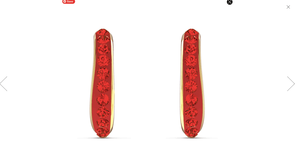 Pair of gold earrings adorned with vertical rows of red gemstones