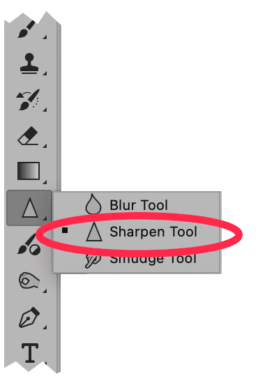 Photoshop toolbar showing the Sharpen Tool selected from the Blur Tool group, used for enhancing image clarity and detail.