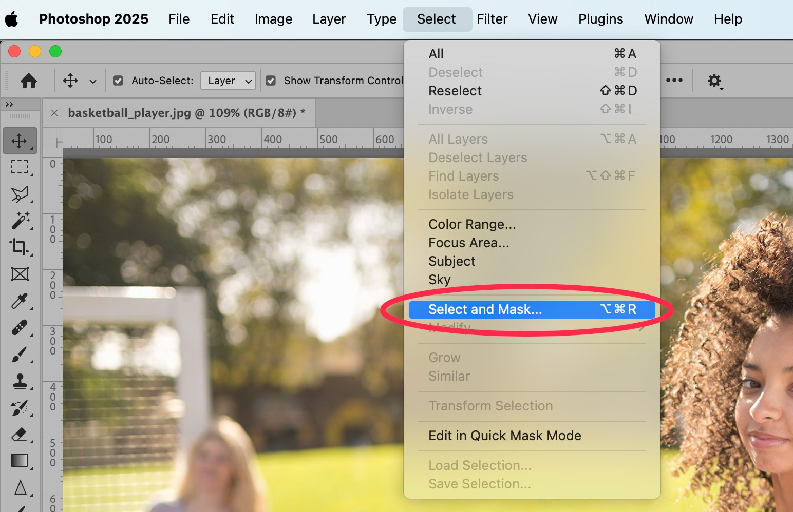 Photoshop 2025 Select menu with 'Select and Mask' highlighted, preparing to refine selections for precise cutouts of a sports portrait.