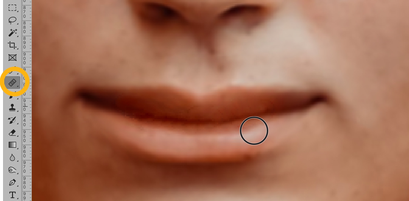 Close-up of Photoshop Healing Brush tool selected for smile retouching adjustments