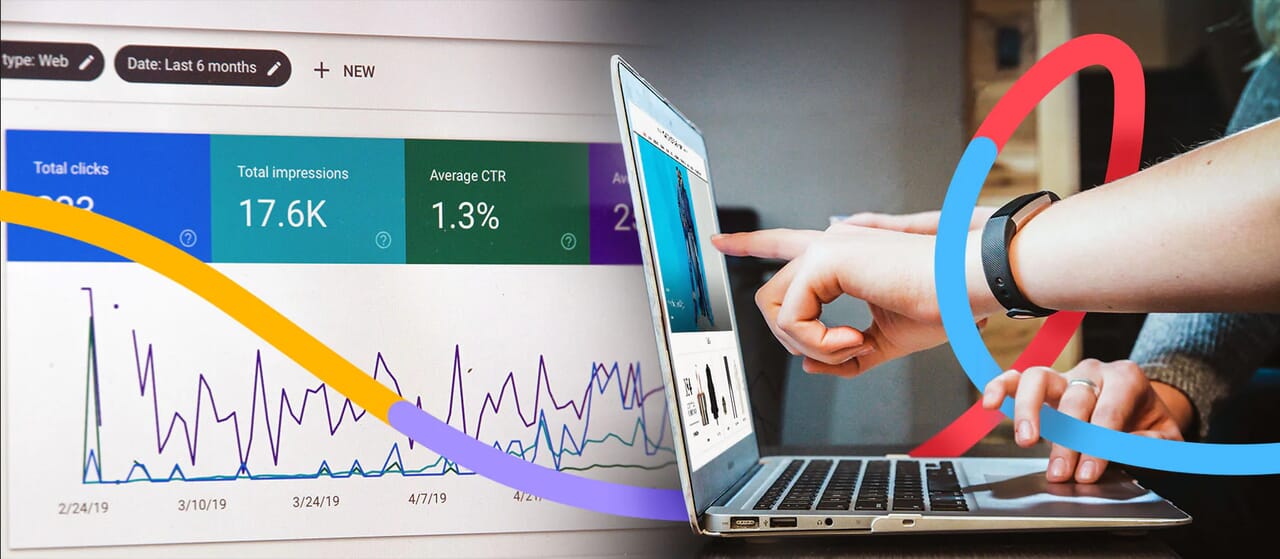 Hands pointing at data analytics and SEO metrics on a laptop screen with graphs and CTR insights.
