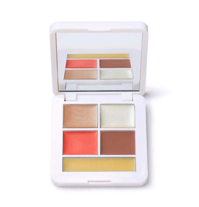 Open minimalist makeup palette featuring six warm-toned shades with a built-in mirror.