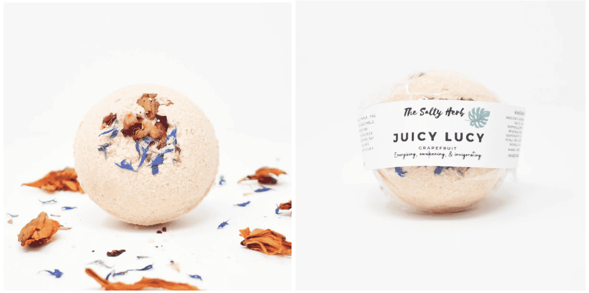 Juicy Lucy grapefruit bath bomb by The Salty Herb with dried floral accents, shown with and without packaging.